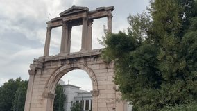 an ancient arch with columns in the city - Powered by Shutterstock - Get 15% off with code: PIKWIZARD15