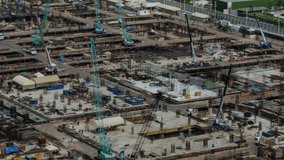 Construction technology concept with alteration graphic over construction site showing concept of automation and remote wireless machine control by using futuristic HUD in a computer software . - Powered by Shutterstock - Get 15% off with code: PIKWIZARD15