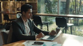 Portrait of despaired Indian businessman raises hands emotionally at laptop in office. Man investor expresses stress losing money on stock market in co-working room. Business fail - Powered by Shutterstock - Get 15% off with code: PIKWIZARD15