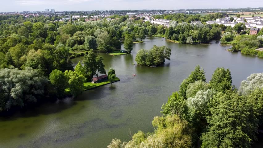 Aerial view of the Hortillonnages of Amiens made of several islands covered with gardens sheds and plantations in a swampy area of the river Somme in Picardie, France