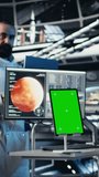Vertical video Astronauts flying together in starship exploring Mars, seeking extraterrestrial life. Cosmonaut in spacecraft ensuring operational readiness before landing on red planet to test - Powered by Shutterstock - Get 15% off with code: PIKWIZARD15