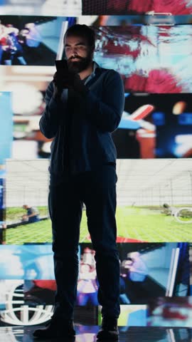 Vertical Video Young addicted guy obsessing over social media presence at all times, isolation in the real world and anxiety building up. Obsessive dangerous doomscrolling and overuse. Camera B.