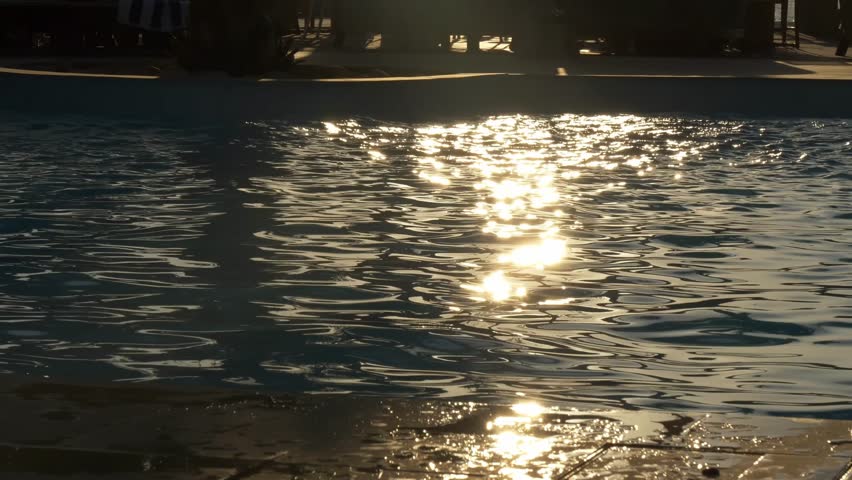 Sunset on a pool in tropical resort, Madagascar Nosy Be.
