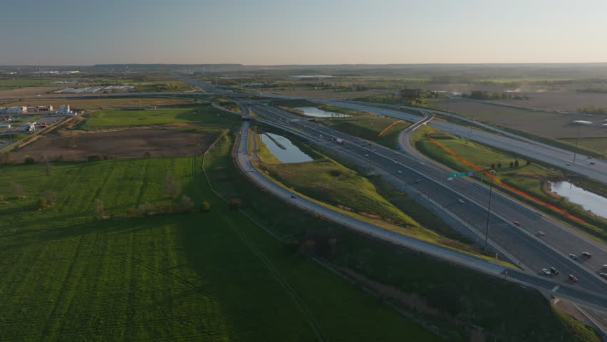 Highway 401 in mississauga, showcasing roads and green landscape, aerial view