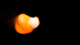 mostly Orange and a little white powder cloud explosion over a black background - Powered by Shutterstock - Get 15% off with code: PIKWIZARD15