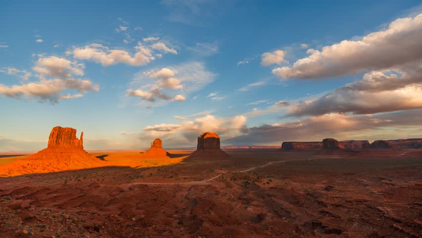 Monument Valley holy grail sunset time-lapse. Desert, red rock and iconic sandstone shapes in Arizona and Utah.