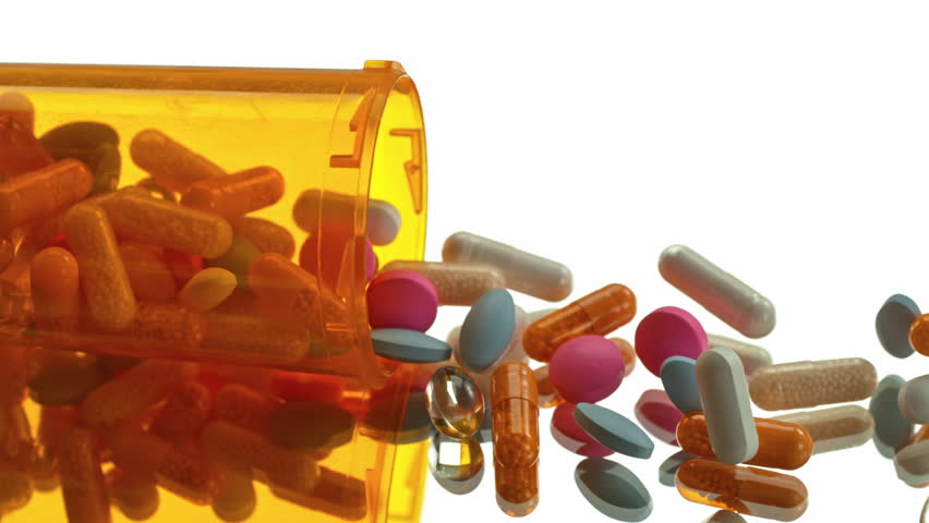 Super Slow Motion of Falling Medicine Dose with Various Pills at 1000fps. Pharmacy concept.