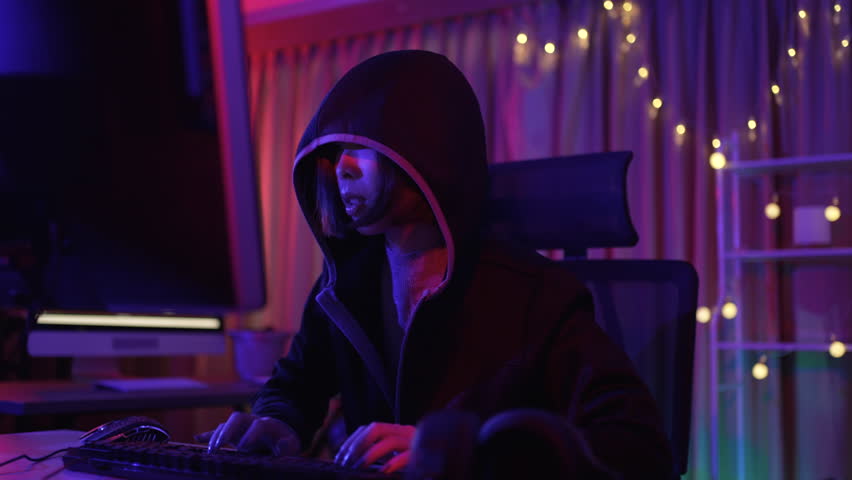 Hacker is working with computer. Cyber security, Technology.
