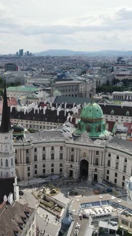Aerial View Overlooking Hofburg Palace and Michaelerplatz In Vienna. Vertical Video, Orbit Motion