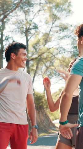 Outdoor, friends and smile with high five for fitness, celebration and motivation for running together. Nature, applause and people with hands for support, synergy and excited group for exercise goal