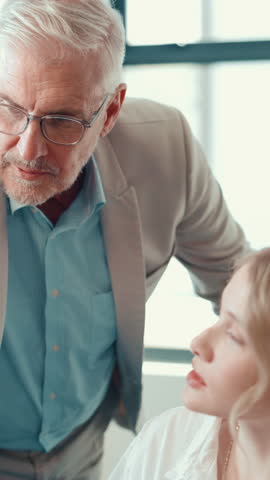 Help, teaching and business people with mentor in office for coaching, advice or project feedback. Discussion, media agency and mature supervisor with employee for explaining, learning or support