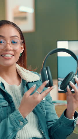 Content creator, face and woman with headphones for review, sound quality or music. Live streaming, talk and show tech for product sponsorship, promo or advertising with audiophile with pov at home
