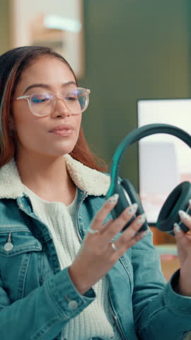 Live streaming, face and woman with headphones for review, sound quality or design. Content creator, talk or show tech for product sponsorship, promo or advertising with audiophile with pov at home