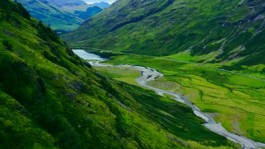 Serene Twilight Scenery with Tranquil Waters, Dramatic Peaks, and Vibrant Sunset Sky Captured in High-Definition Photography, Perfect for Travel, Adventure, Nature, and Landscape Themes