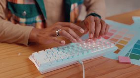 Color swatch, hands and typing on keyboard in office, software navigation or online for creativity. Closeup, person and graphic designer with technology for startup business, design agency or palette - Powered by Shutterstock - Get 15% off with code: PIKWIZARD15