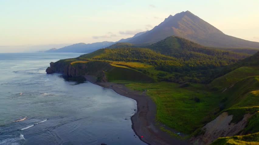 Serene Twilight Scenery with Tranquil Waters, Dramatic Peaks, and Vibrant Sunset Sky Captured in High-Definition Photography, Perfect for Travel, Adventure, Nature, and Landscape Themes