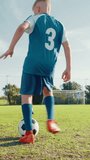 Kick, kids or boy soccer player with goal for winning at game or match in youth tournament. Sports, exercise or back of football athlete shooting ball in net at target practice on field at stadium - Powered by Shutterstock - Get 15% off with code: PIKWIZARD15