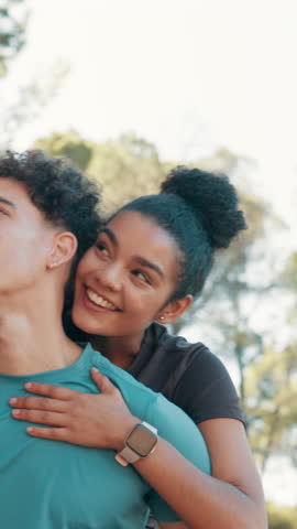 Outdoor, couple and piggyback with pointing for fitness, sightseeing and bonding with conversation. Nature, carrying and man with woman for relationship, exercise break and walking with laughing