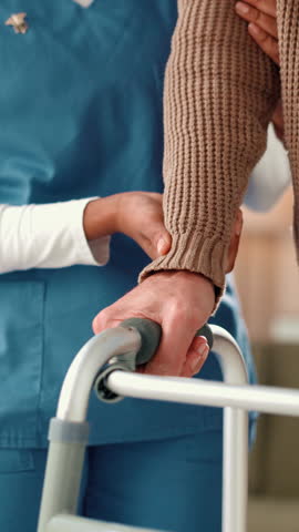 Nurse, hands and patient with walker for elderly care, mobility or assisted living at home. People, caregiver or physiotherapist with walking aid for muscle recovery or balance at old age house