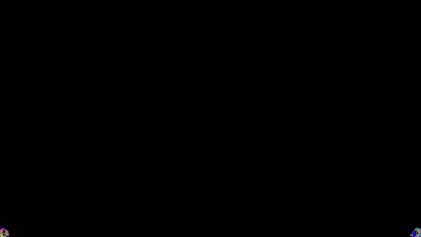Explosion like effect of many playing card suits including hearts spades clubs and diamonds bursting from the bottom corners on a black screen