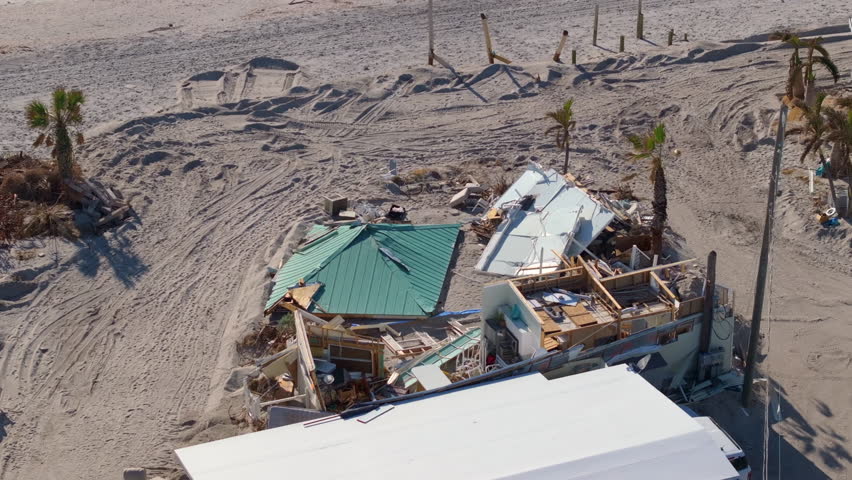 Natural disaster and its consequences. Hurricane destroyed house roof and walls in Florida coastal area.