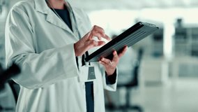 Laboratory, hands and scientist with tablet for results, investigate and scroll research for medical. Healthcare, person and doctor with tech for online study, information and test report in app - Powered by Shutterstock - Get 15% off with code: PIKWIZARD15