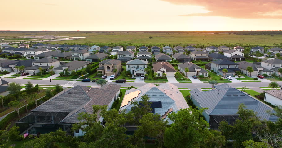 Wealthy neighborhood with expensive houses in southern Florida. Development of US premium housing market