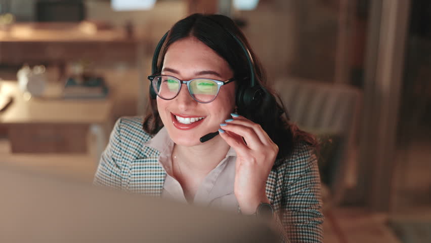 Headset, woman and call center agent in office at night for international consultation with translation. Mic, tech and female customer service consultant with multilingual support for global client. - Powered by Shutterstock - Get 15% off with code: PIKWIZARD15
