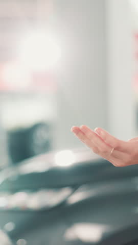 Hands, customer and salesman with keys at car dealership for vehicle purchase, transport hire and test drive. Showroom, person and deal with buyer for automobile collection, rental agreement or offer