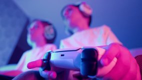 Excited Gamers Kids Brothers Playing Video Game On Console With Gamepad At Home - Powered by Shutterstock - Get 15% off with code: PIKWIZARD15