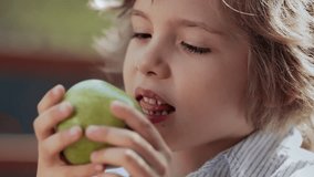 Handsome boy bite raw green apple. Healthy teeth lifestyle, fresh organic food - Powered by Shutterstock - Get 15% off with code: PIKWIZARD15