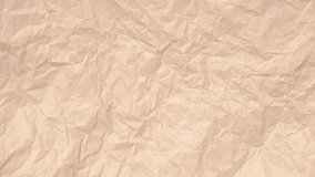 Loop of Craft Paper with deep folds and subtle crumples. Natural fiber texture and soft shadow animation create a tactile handmade backdrop for titles, logos or vintage scenes. - Powered by Shutterstock - Get 15% off with code: PIKWIZARD15