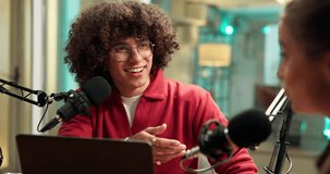 Podcast host, guest and microphone with laughing for funny interview, story joke or discussion. Live streaming, laptop and radio presenter with woman in studio for talk show or comic on air recording - Powered by Shutterstock - Get 15% off with code: PIKWIZARD15