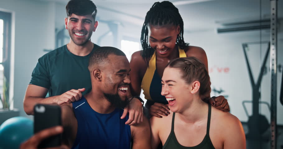 Selfie, group and people in gym, fitness and training with support, influencer and post on social media. Diversity, friends or men with women, exercise or smile in wellness center, cheering or health