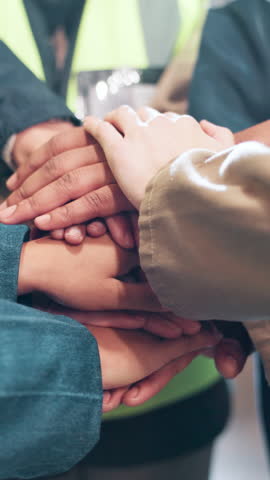 Business people, contractor and team with hands together at warehouse for distribution service or unity. Closeup, group or employees piling with mission for supply chain, trust or support at depot
