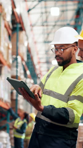 Businessmen, contractor or logistics with tablet for inventory, inspection or quality assurance at warehouse. Male people, employees or distribution with technology for shipping or storage control