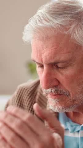 Sick, headache and senior man in home with pain for flu, cold or medical illness with symptoms. Disease, brain aneurysm and elderly male person with migraine for neurology condition in house.