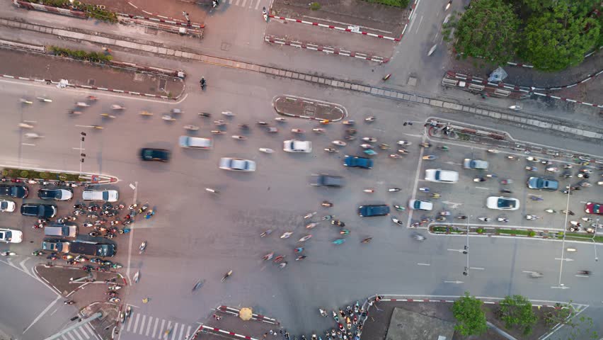Aerial hyperlapse captures bustling traffic at Giai Phong - Dai Co Viet street in Hanoi, Vietnam during peak hours