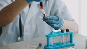 Medical Research Laboratory Portrait of a Female Scientist Wearing Face Mask Using Micro Pipette for Analysis. Advanced Scientific Lab for Medicine, Biotechnology Development. Shot Video  - Powered by Shutterstock - Get 15% off with code: PIKWIZARD15