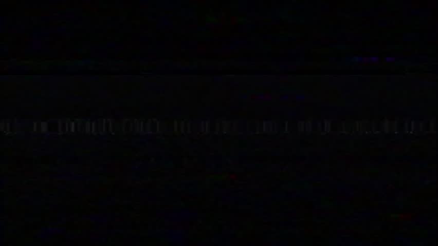 Short VHS glitch burst with scan lines. Includes chromatic shifts, static bands and analog distortion.
