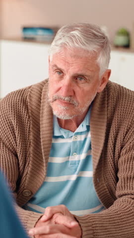 Therapy, stress and mature man in session for mental health, depression or anxiety consultation. Psychology, burnout and male person in counseling for emotion, trauma or exhaustion at medical clinic.