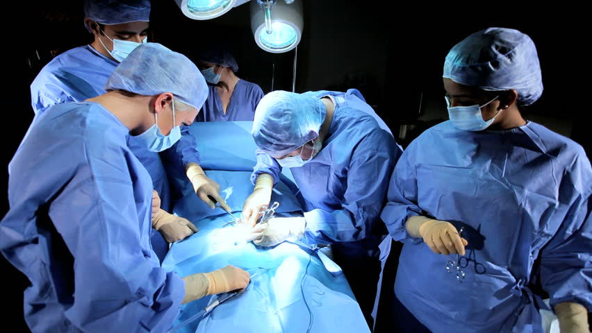 Doctor Wearing Protective Clothing Performing Stock Footage Video