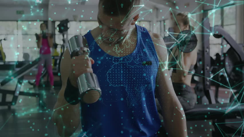 Mid-adult man performing bicep curls at gym starting network overlay tracking fitness metrics. Fitness, strength, technology, wellness, determination, training, modern - Powered by Shutterstock - Get 15% off with code: PIKWIZARD15