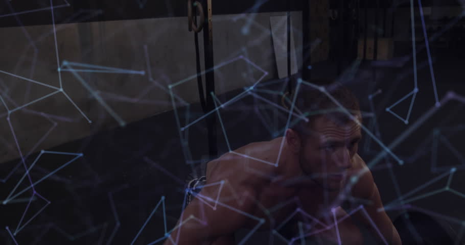 Man stepping into power rack gripping barbell in gym pressing weight upward demonstrating strength. Strength, fitness, workout, training, muscular, gym, powerlifting