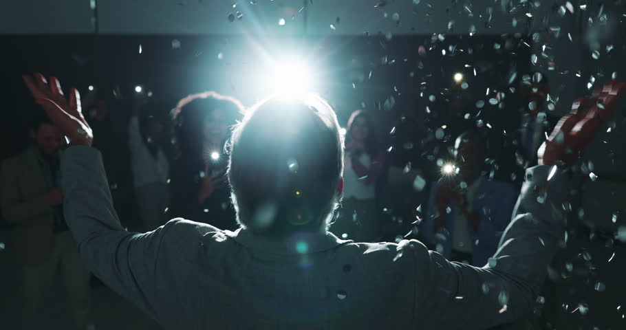 Business people, night and celebration with confetti at award ceremony for success or winning. Group, employees or winner with praise or glitter in evening for congratulations at summit or seminar