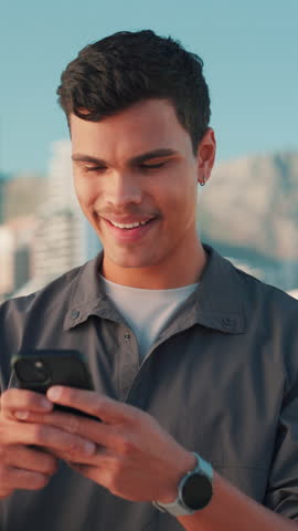 Phone, happy and man in city for social media, mobile app and networking on internet in town. Travel, street and person on smartphone for website, online connection and message notification outdoor