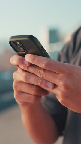 Phone, typing and hands of man in city for social media, internet and networking in urban town. Closeup, street and person on smartphone for website, online connection and message notification