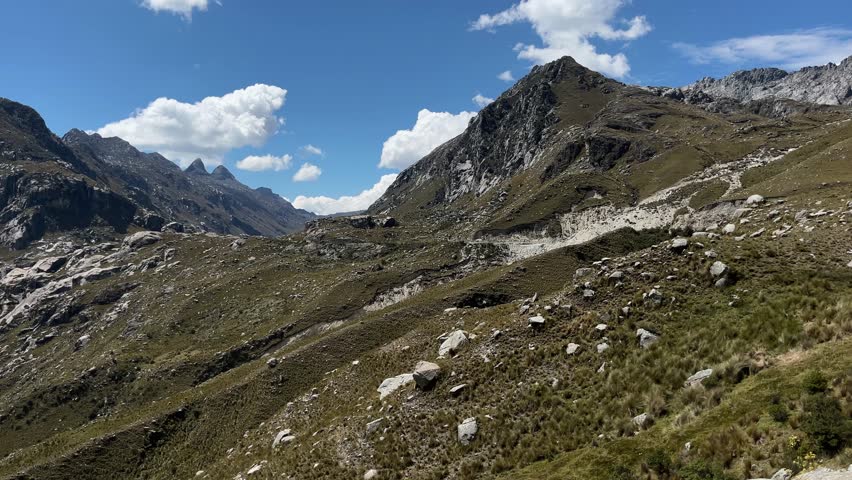 Andes mountains and turquoise Huascaran lake in Peru