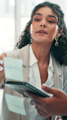 Business woman, writing and planning with tablet for brainstorming, strategy or reminder at office. Female person, planner or mindmap with technology or ideas for company agenda or tasks at workplace