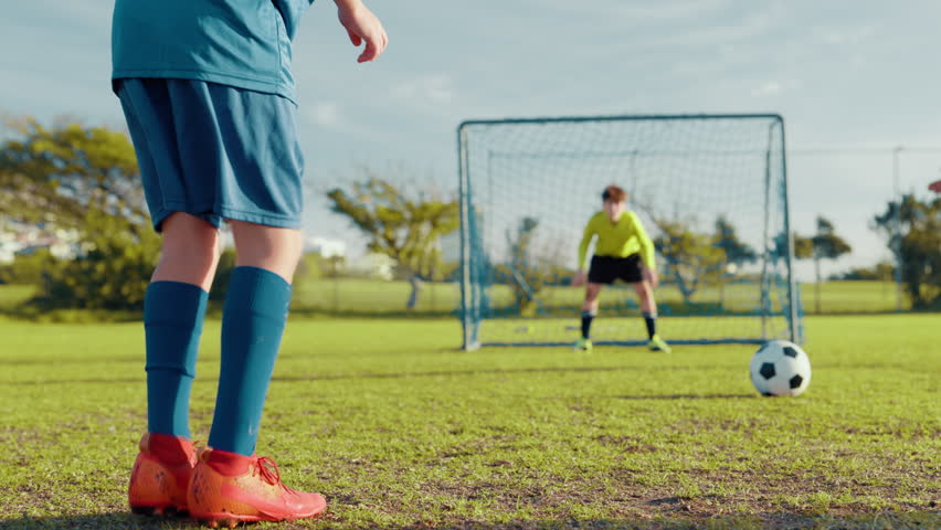 Fitness, soccer and goalkeeper with kids on field for penalty kick, sports athlete and game training. Tournament, learning and target practice with football player outdoor for club and challenge